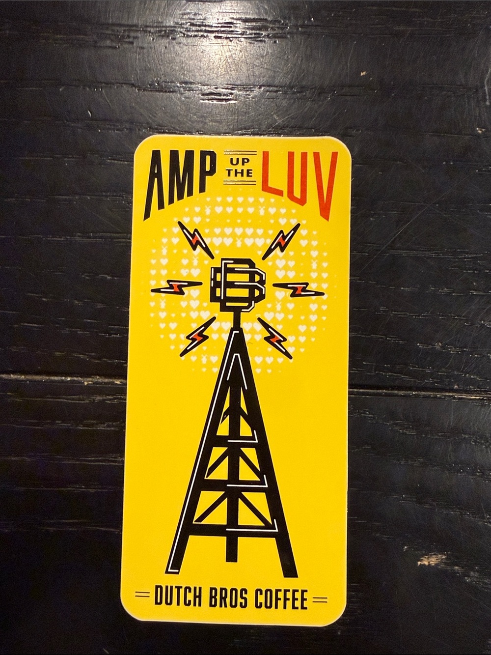 Dutch Bros Yellow and Black 'Amp Up The Luv' Tower Sign
